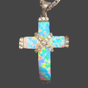 1 1/4” by 3/4” Australian opal handmade curved back SS pendant on 26” SS chain